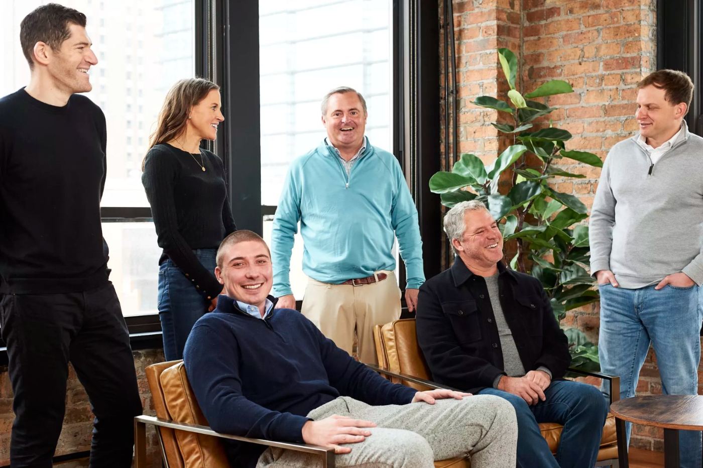 The Superior Studios team together in the office lounge